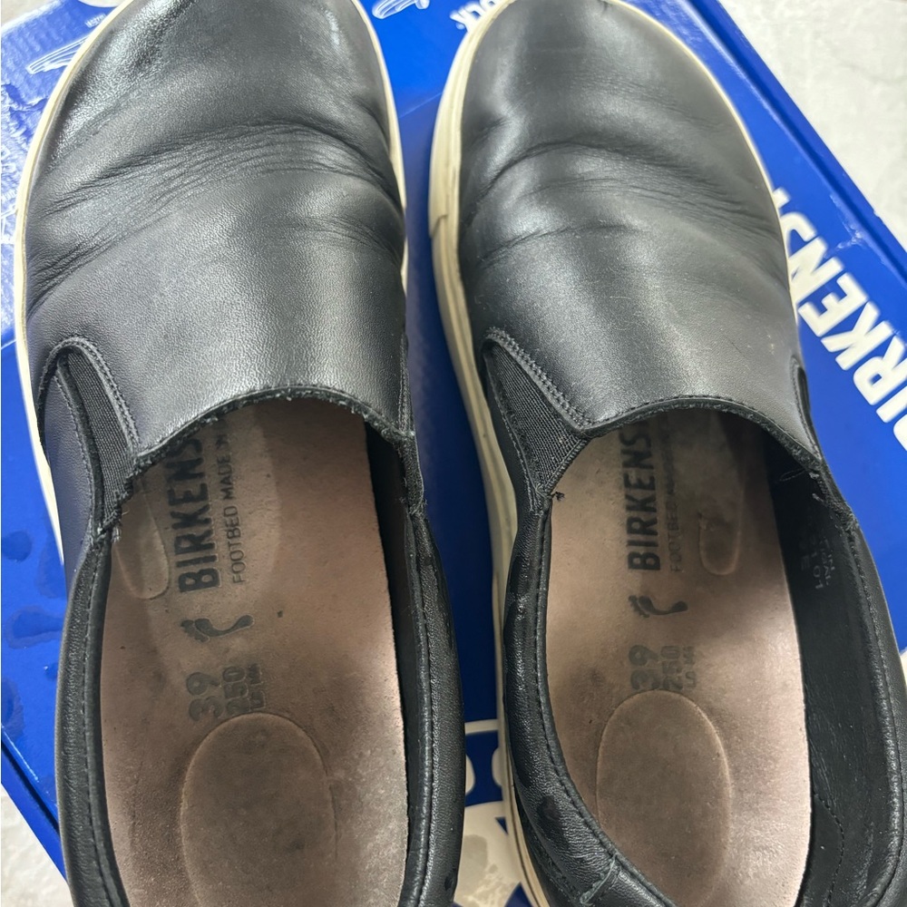 Black leather Birkenstocks